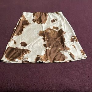 Cow print mini satin skirt with slit